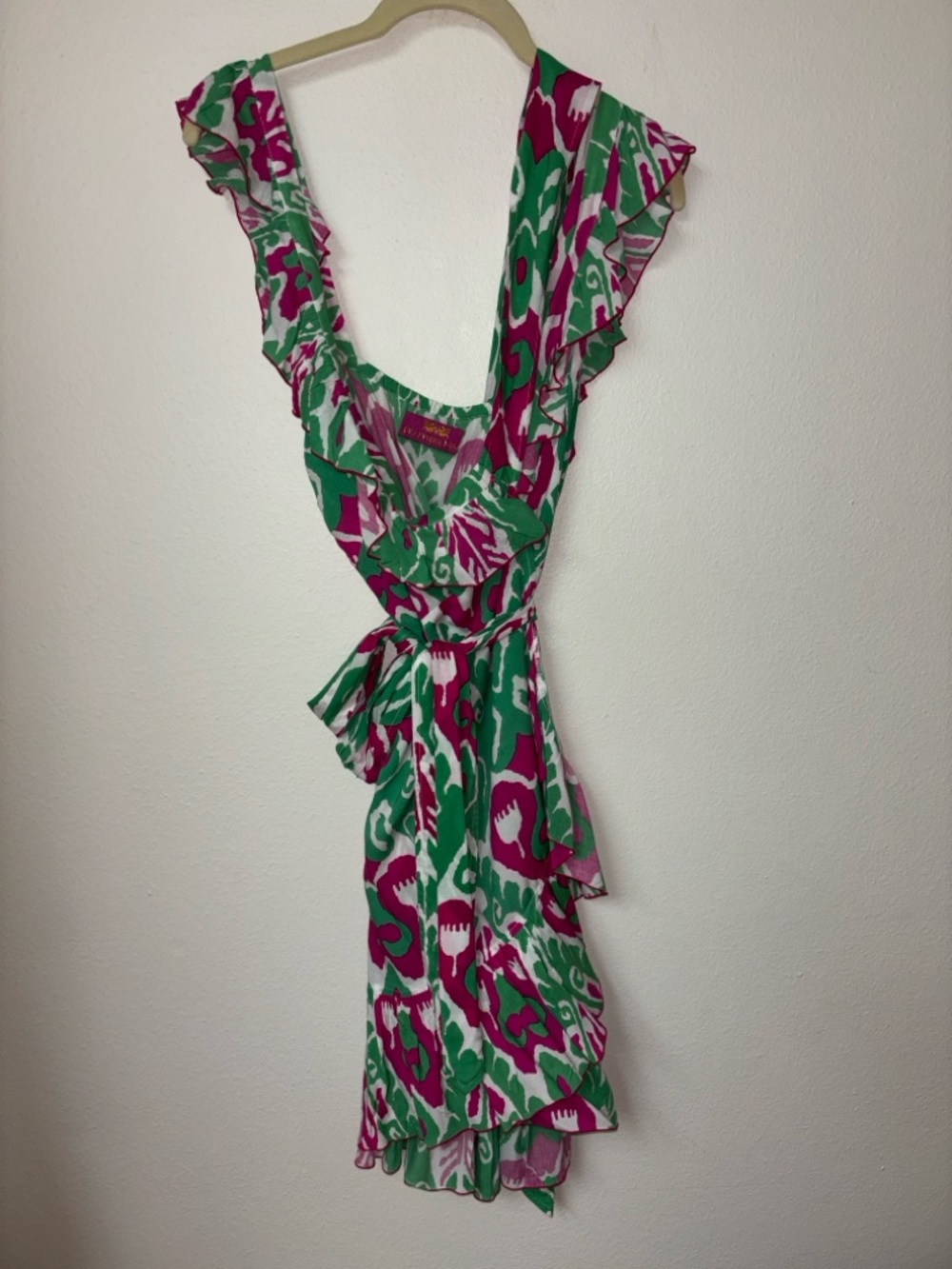 NWOT. Great wrap dress by Feather & Find. Size S